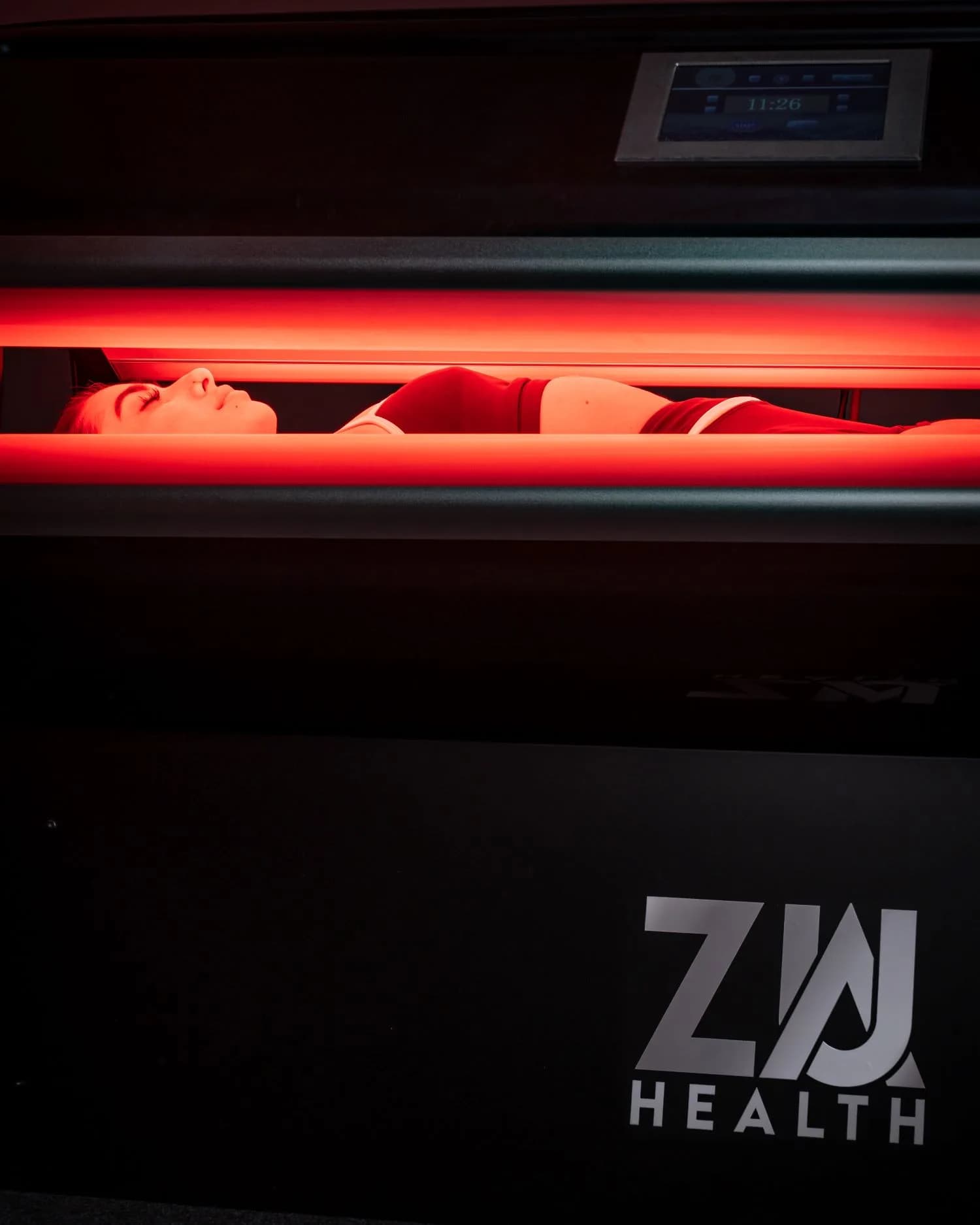 Full-body red light therapy session